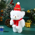 Close-up of a white plush bear wearing a red LOVE hat and scarf with Christmas decor - 15-18cm / Blush White Bear + Red Hat Red Scarf