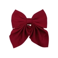Detailed close-up of a large dark red fabric bow hair clip with matte candy color finish - Dark Red