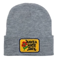 Gray knitted beanie hat featuring a yellow 'Have a Nice Day' patch and flower embroidery - Adult - Adjustable / Light Heather Grey
