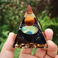 Orgone crystal pyramid with obsidian and life tree symbol held in hand near nature - 6cm / A17-Obsidian Tree of Life Brown Ball