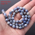 8mm faceted natural blue spot stone beads 15 inch strand held in hand for jewelry making - 8mm Faceted Beads