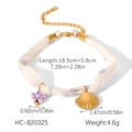 Detailed view of bohemian silk fabric bracelet with lavender floral print and shell charm - Purple Floral Style (HC-B20325)
