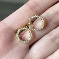 Elegant gold-plated geometric circle stud earrings featuring micro-paved white zircons - Gold