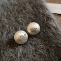 Matte silver ball stud earrings featuring a custom logo design on a soft grey surface - Matte Silver (925 Sterling Silver Earring Post)