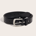 Vintage black leather belt for women featuring silver rhinestone heart buckle on beige background - Black