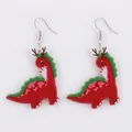 Detail of acrylic Christmas dinosaur earrings with red body and brown antlers - Red Dinosaur with Antlers