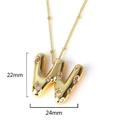 Macro view of gold letter W pendant with sparkling diamonds and 22mm size detail - Letter W(XED218)