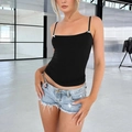 Slim fit black tank top with bow detail and spaghetti straps paired with denim shorts - S / Black