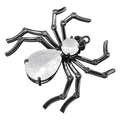 Detailed view of a vintage spider pendant with black metal and faceted teardrop gemstones - Spider / Gunmetal