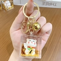 Golden Maneki Neko lucky cat acrylic keychain featuring gold foil flakes and bell - Lucky Cat Family - Ten Thousand Liang / Individual Packaging