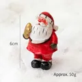 Miniature Santa Claus figurine for Christmas decor, 6cm resin ornament weighing 50g - Standing Santa with Star