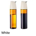 Set of two amber glass oil bottles with cream-colored gravity lids and drip-free spouts - 2 Pcs/Set / White