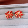 Macro shot of vintage red firework stud earrings with gold plating and cubic zirconia - Gold & Bright Red (Silver Needle)