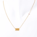 Golden stainless steel angel number 999 necklace featuring a small pink gemstone - 999