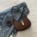 Dark brown crescent shoulder bag in smooth leather with elegant gold hardware - Brown