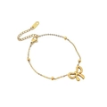 Détail de la chaîne en acier inoxydable doré avec un pendentif en forme de nœud poli - Bracelet Nœud Papillon 【e2025】 Or