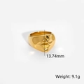 Close-up of gold punk face ring with relief detail showing 13.74mm height and 9.1g weight - US 7 / Gold