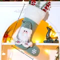 Light green Santa Christmas stocking with 3D figurines and white faux fur trim, 43x25cm - Christmas Stocking with Santa