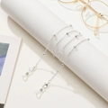 Detail of silver beaded eyeglass chain with lobster clasps and silicone loops - Silver