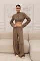 Dettaglio della trama a treccia di un completo vintage in maglia con cardigan e pantaloni larghi - S / Cachi