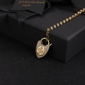 Golden heart-shaped lock pendant necklace featuring a snake pattern and micro-set zircons - White 5 (Snake Pattern)