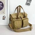 Retro kaki canvas schoudertas met bruine lederen handvaten en meerdere vakken - Khaki