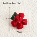 Handmade red wool felt snowflake ornament with gold embroidery and green bow tie - Red Snowflake