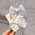 Pair of sweet blue satin and white lace bow hair clips for girls on display card - Blue Lace Bow Pair
