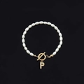 Elegant white oval pearl bracelet with a golden T-bar clasp and rhinestone letter P charm - Gold Letter P (SL2013)
