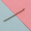 Detailed view of rainbow-colored stainless steel extension chains on a pastel background - 5cm / Rainbow