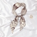 Beige silk neckerchief with brown totem pattern and letter Q detail on white fabric - Letter Q - Brown Classical Pattern