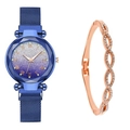 Detail of blue starry sky dial watch with Roman numerals and matching gold bracelet - Watch+Bracelet / Blue