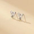 Sparkling zircon bow knot earrings in silver finish with delicate drop stone detail - Silver Small Bow