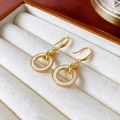 Élégantes boucles d'oreilles croisées dorées avec cercle émail blanc et zircon - 77# Tige en Argent - Boucles d'Oreilles Pendantes en Émail en Forme de X Croisé Doré
