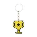 Close-up of yellow trophy PVC keychain with black star pattern for sports parties - Trophy Shape (Style 2)