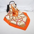 Orange satin square scarf with equestrian chain print tied to a leather handbag handle - 90x90cm / Orange (D9043)