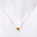 Titanium steel heart necklace featuring a yellow birthstone on a gold chain - November