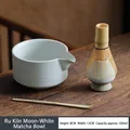 Ceramic Matcha bowl set with bamboo whisk and scoop on dark wood surface - Moon White Ru Kiln Matcha Bowl 4-Piece Set