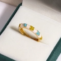 Macro shot of colorful enamel flower ring with pink, blue and yellow blossoms in a gift box - Colorful Pastoral Flower Style (Style 3)