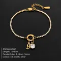 14K gold plated stainless steel tennis bracelet with letter S and crystal pendant - S