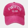 Pink washed cotton baseball cap featuring white SWIFTIE EST. 1989 embroidery detail - Rose Red