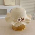 Kids straw sun hat with wavy lace trim and two-tone crochet flower on golden display stand - Set - Beige