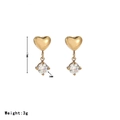 Elegant gold heart stud earrings featuring hanging round cubic zirconia stones - Gold