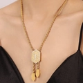 Elegante collana Bolo in acciaio al titanio dorato con ciondolo esagonale lucido - Collana Oro