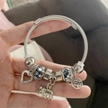Silver beaded bracelet with elephant and tree of life charms on twisted cable band - Black Glass Bead Cupid & Elephant Bracelet