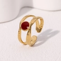 Minimalist gold plated stainless steel open ring with irregular texture and red accent - Burgundy