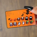 Set of 6 pairs of Halloween themed stud earrings with pumpkin and ghost motifs on card - Clown And Black Cat Collection (E1432-1)