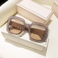 Detail of square oversized glitter frame sunglasses with brown lenses and wide temples - Champagne Frame Champagne Lens