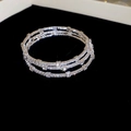 Detailed view of triple-layered silver tennis bracelet with rhinestones on black velvet - 16# 3-Layer Silver Rhinestone Bangle