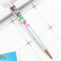 Penna opaca argento con dettagli oro rosa e fiori secchi colorati nel fusto trasparente - Argento